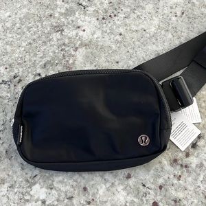 Black Everywhere Belt Bag Brand New still has tag on